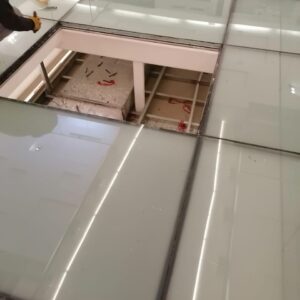 reparación cristal suelo - obras técnicas
